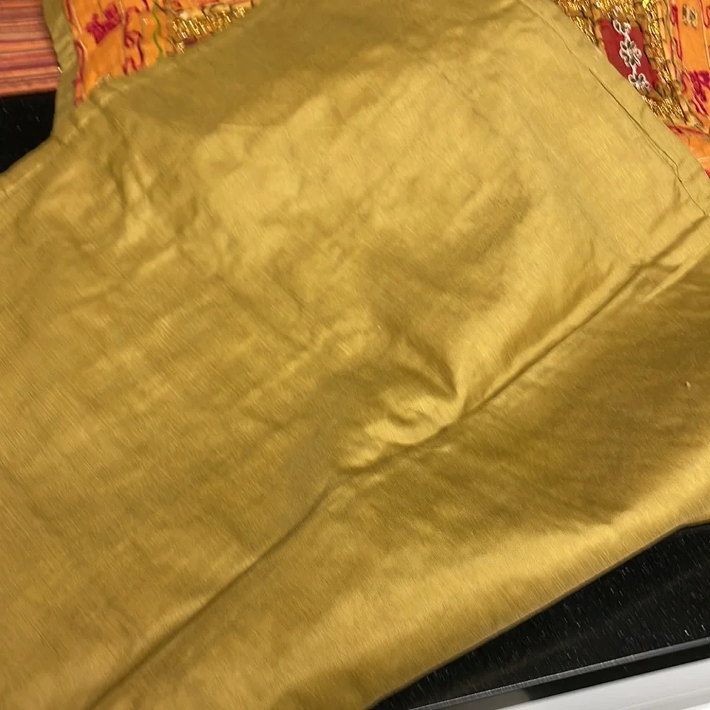 Table runner. 58 in length. Width 22 inches